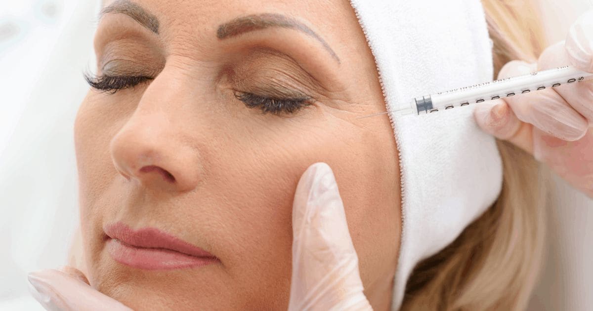 woman receiving botox injection