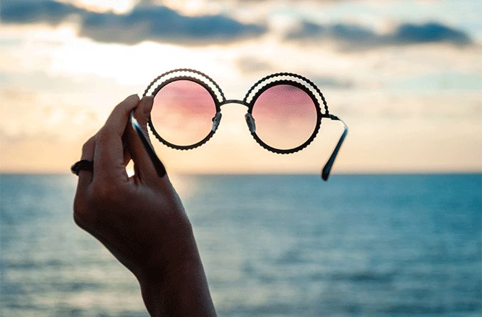 looking at an ocean view through a rose colored glasses