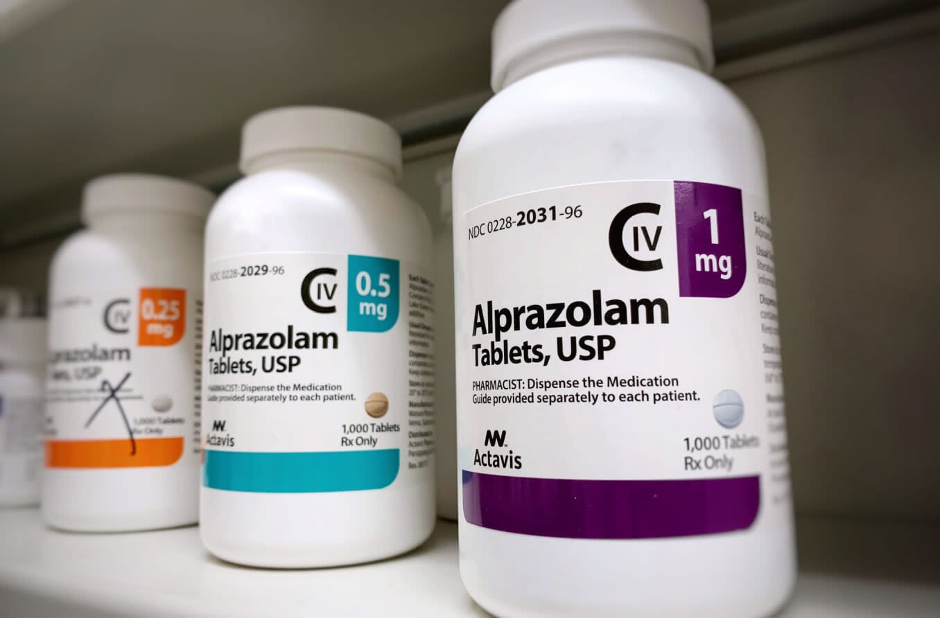 Alprazolam bottle (also known as Xanax) on shelf.