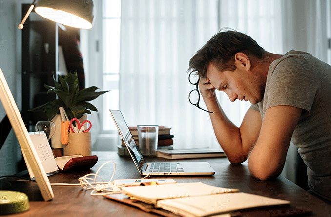 stressed man with vision problems