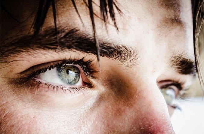 closeup of man with green eyes