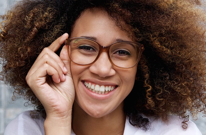 Smiling woman wearing glasses