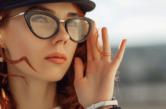 woman wearing cat-eye glasses