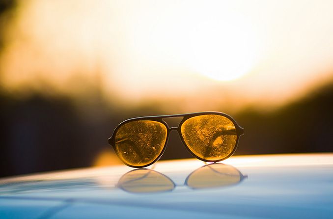 scratched sunglasses outdoors