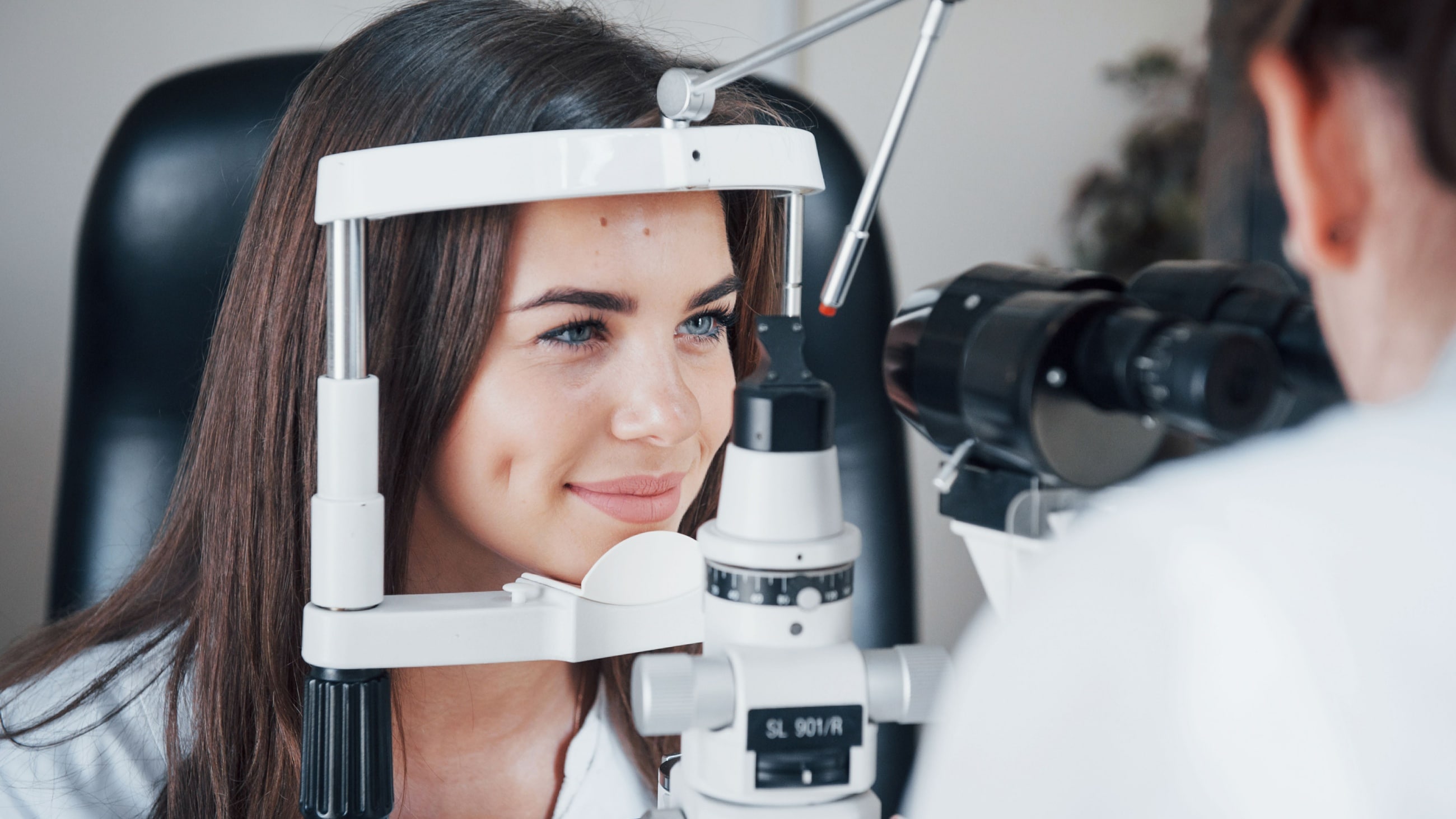 Woman having a glaucoma test eye exam
