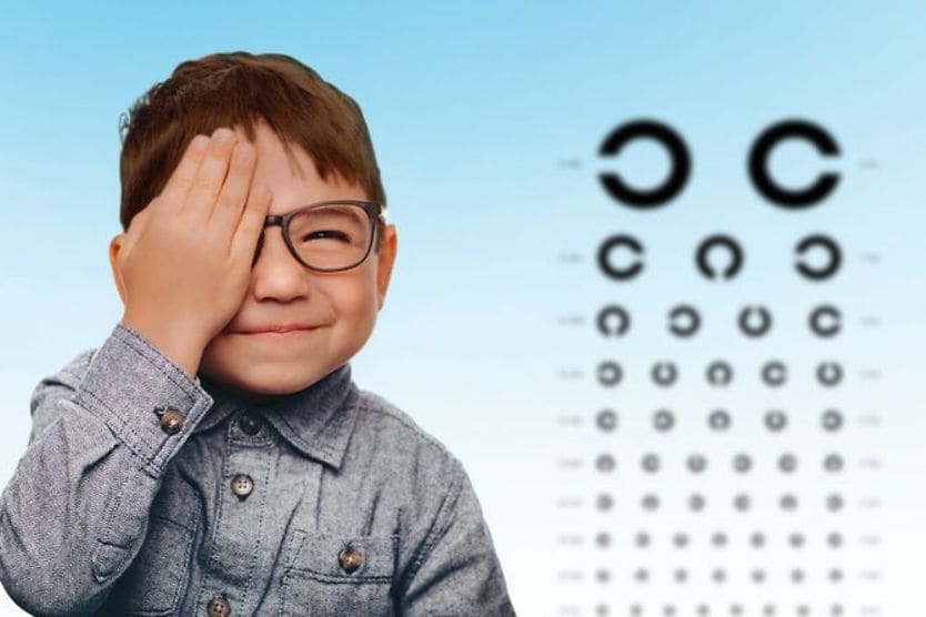 Boy getting an eye exam Boy getting an eye exam