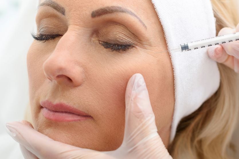 woman receiving botox injection