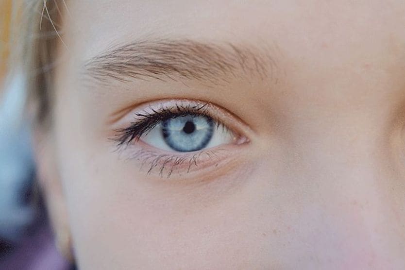 closeup of young child's small pupils