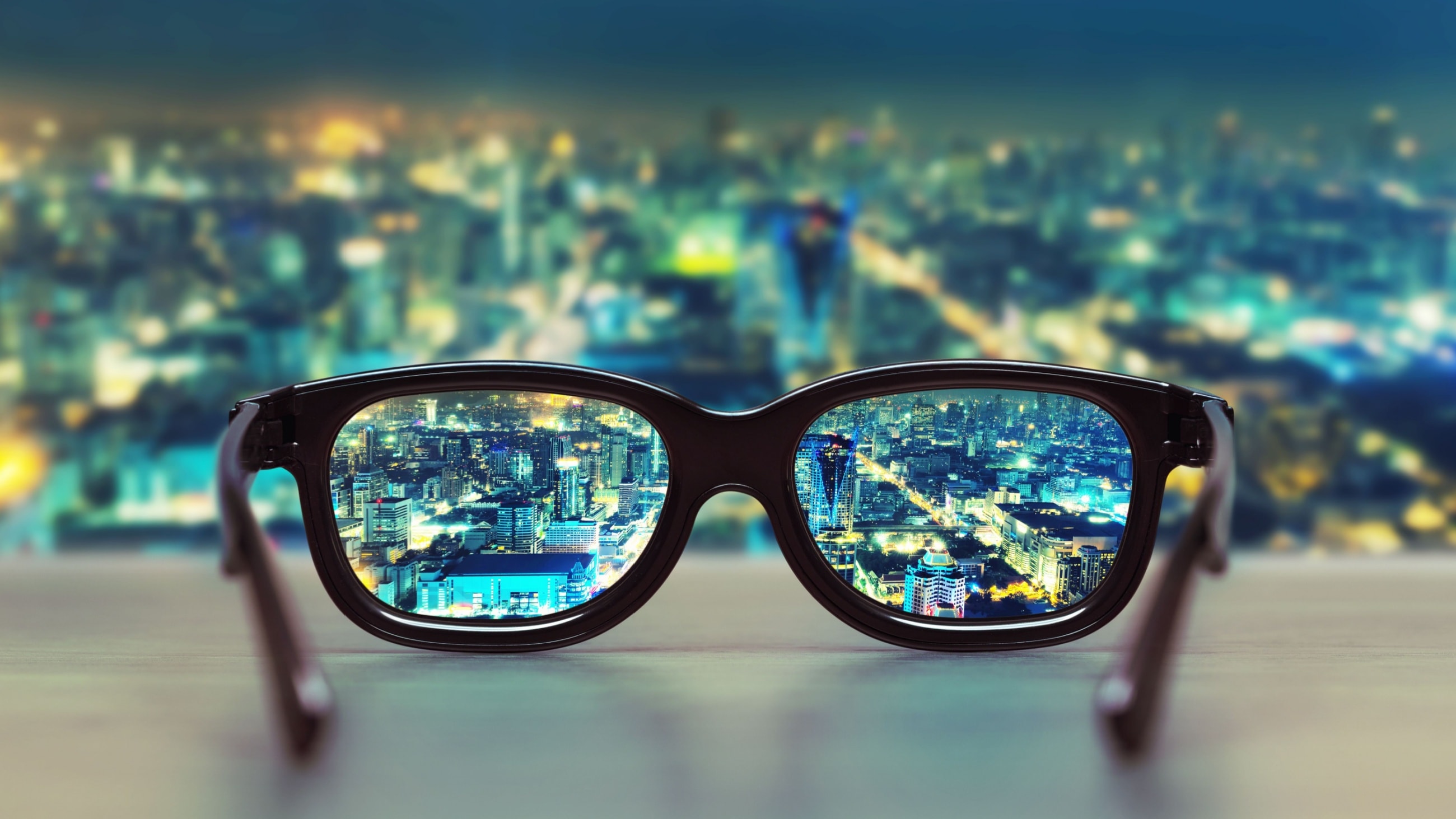 clear view of cityscape seen through a pair of glasses clear view of cityscape seen through a pair of glasses