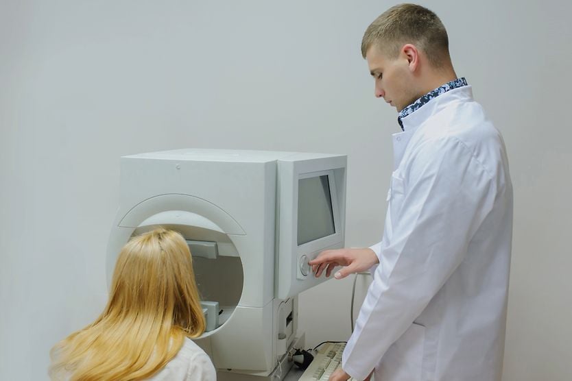 woman receiving a visual field test for ptosis