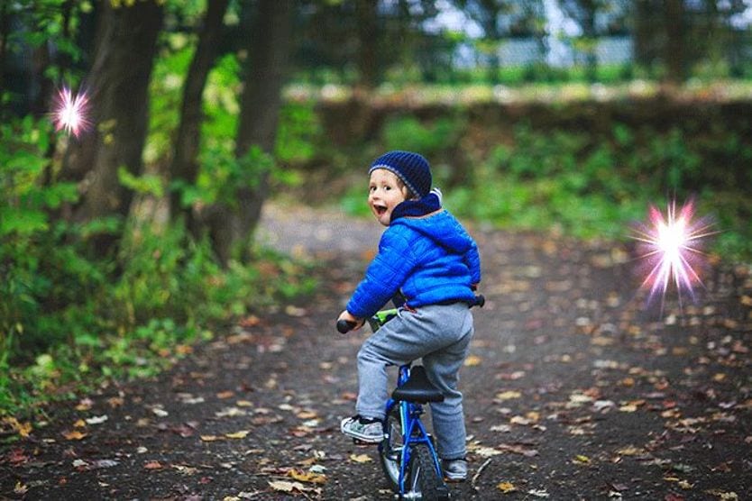 flashes in view of a child riding bike
