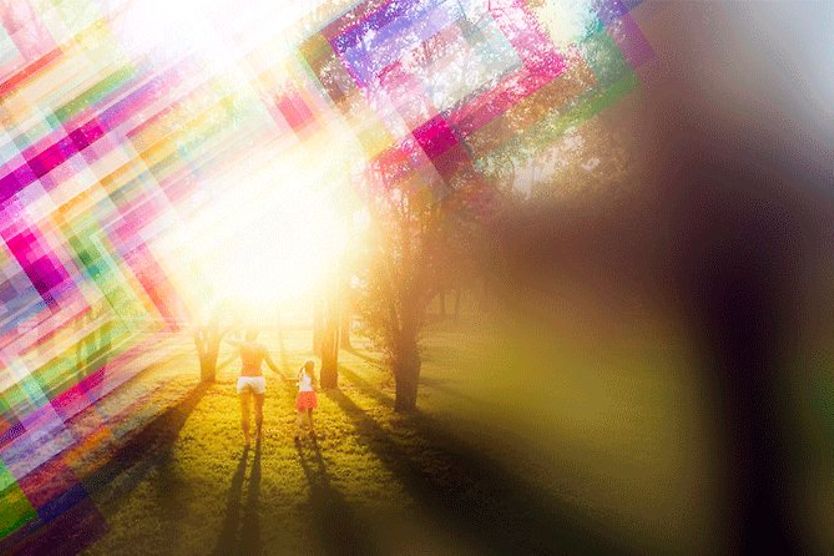 View through an aura of mother and daughter outside View through an aura of mother and daughter outside