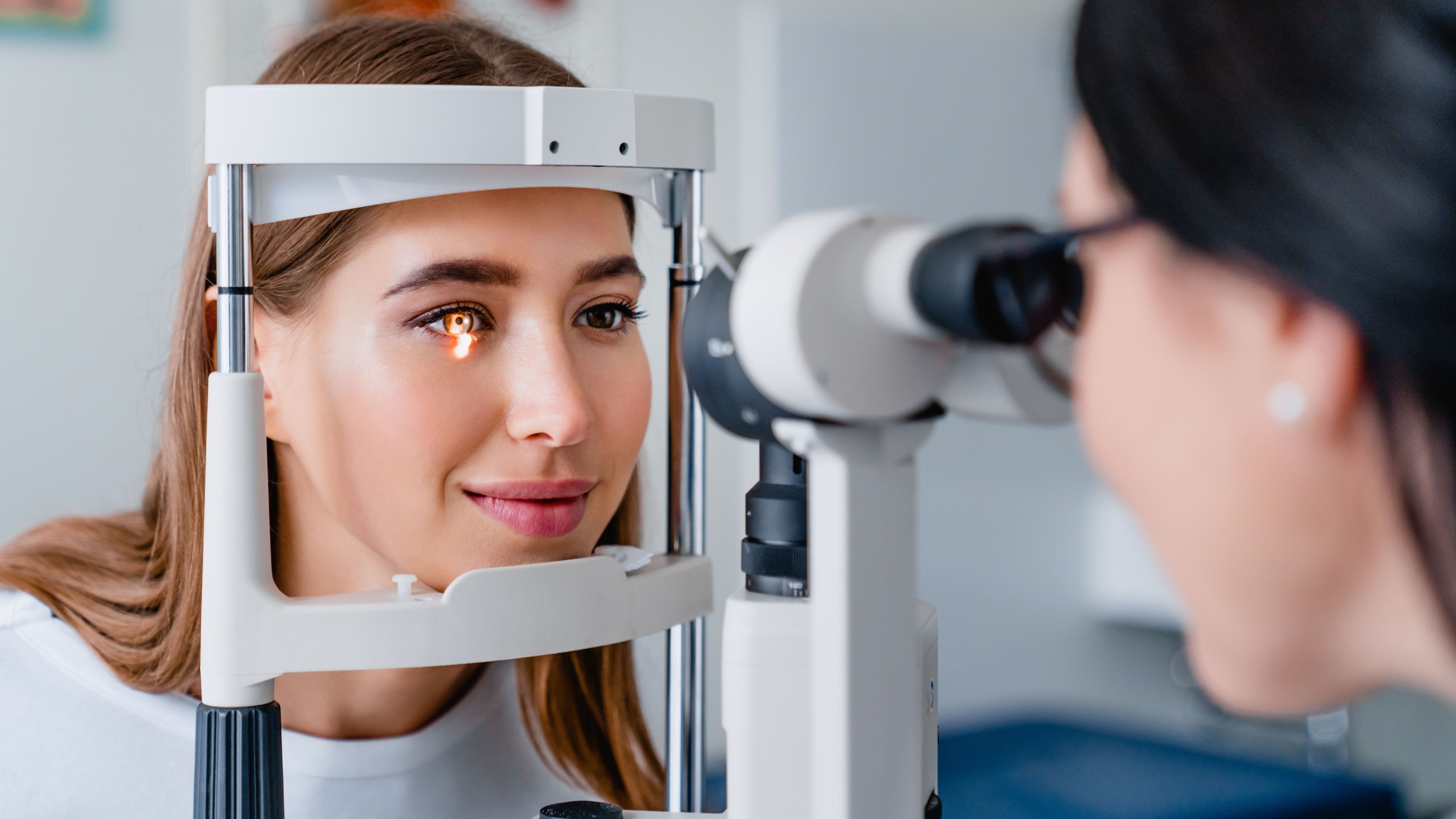 Woman getting an eye exam