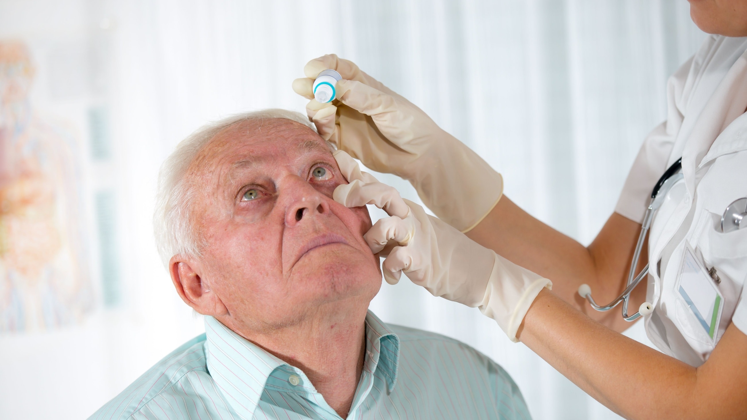 older man with glaucoma getting eye drops as glaucoma treatment