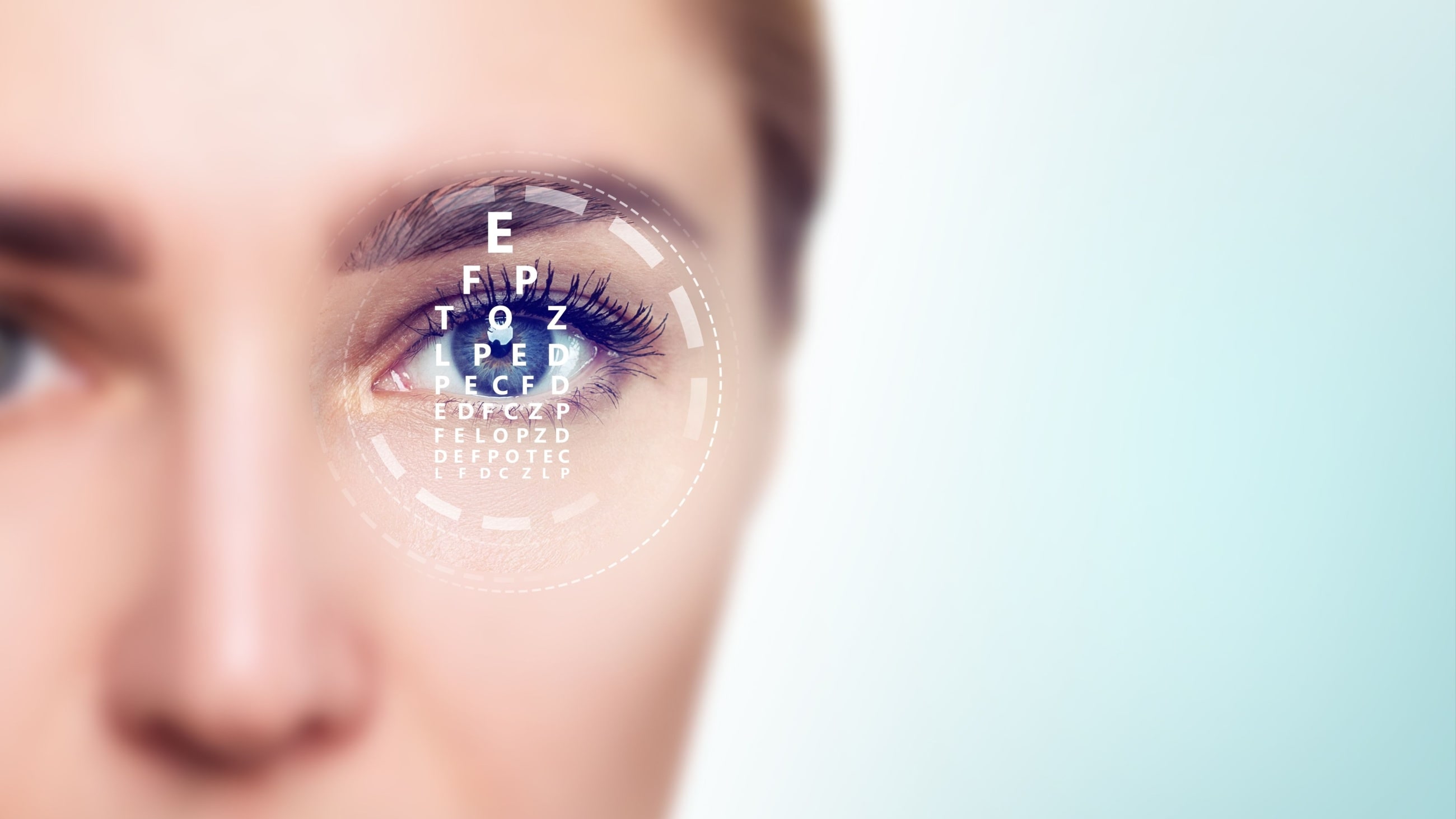 Woman eye and eye chart in scanning circle closeup. 