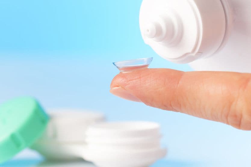 cleaning a contact lens