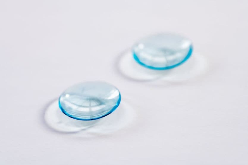 Girl putting in contacts