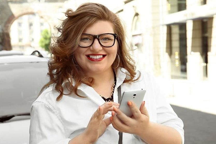 Woman wearing wayfarer eyeglasses