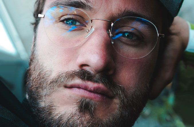 man wearing rimless glasses