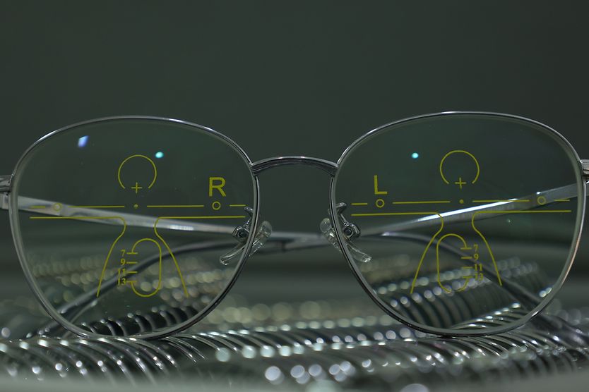 Close-up of glasses with progressive lenses.