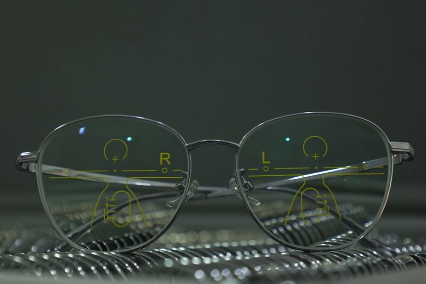 Close-up of glasses with progressive lenses.