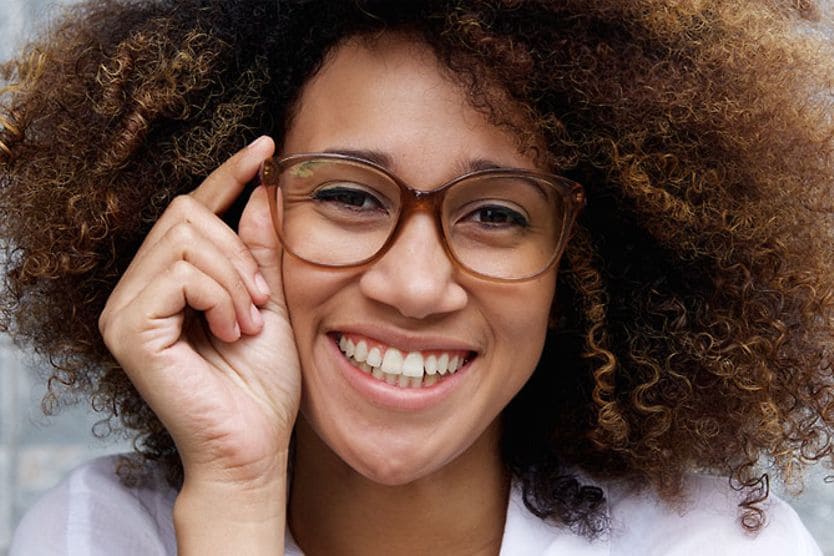 Smiling woman wearing glasses