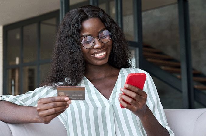 woman buying glasses on frames direct website  on her mobile phone