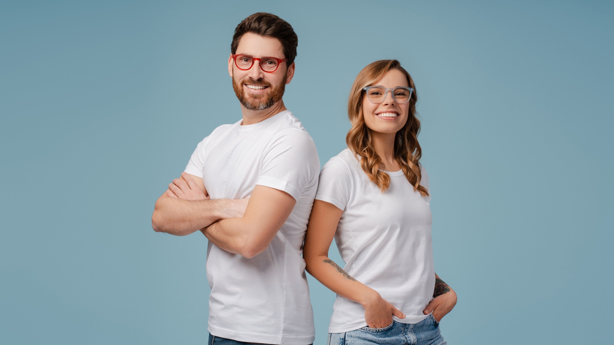 man and a woman wearing eyeglasses