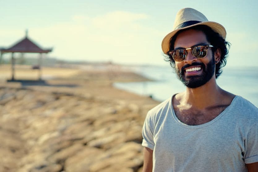 man wearing sunglasses on the beach man wearing sunglasses on the beach