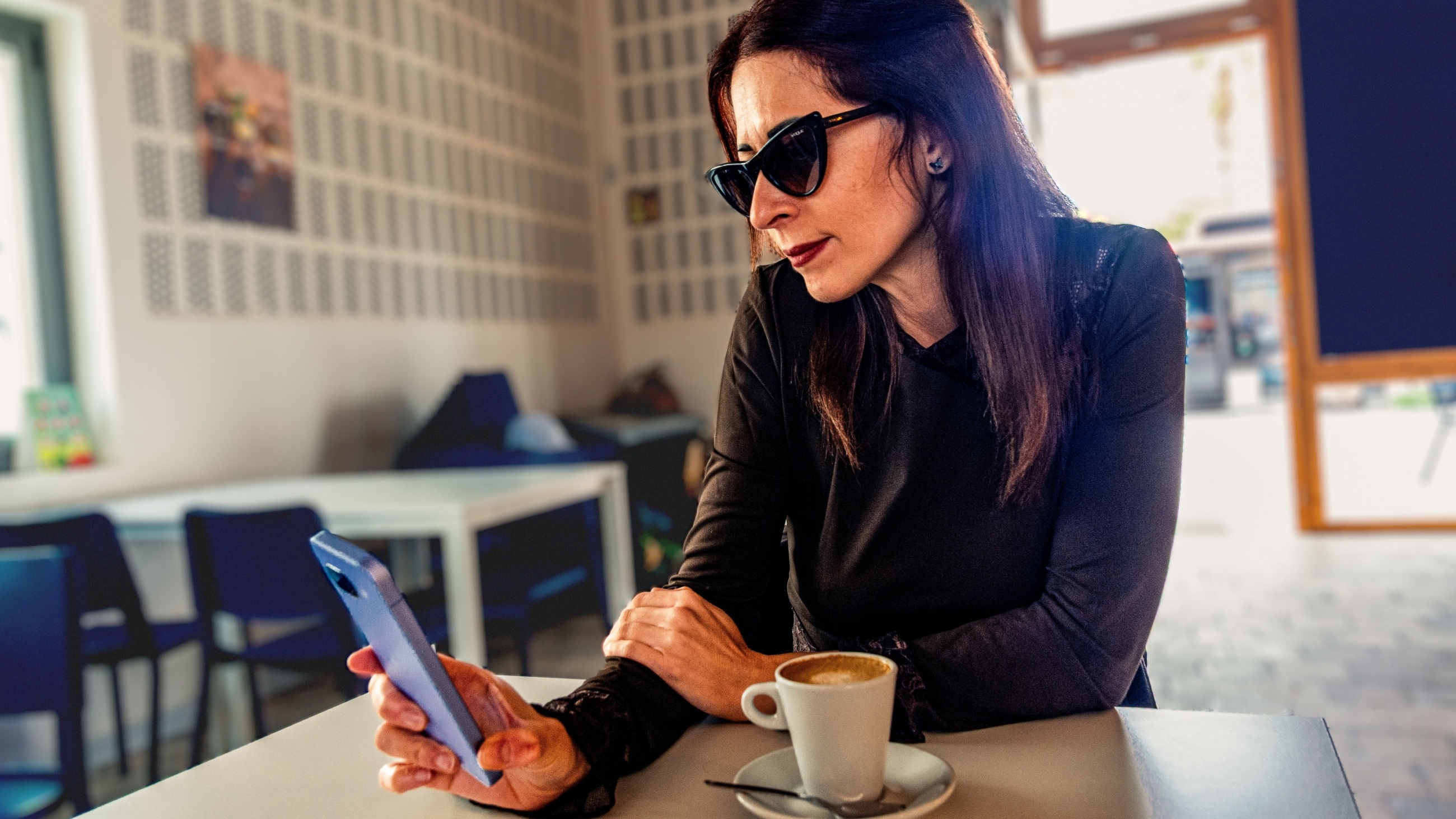 man wearing sunglasses in the tub taking a selfie