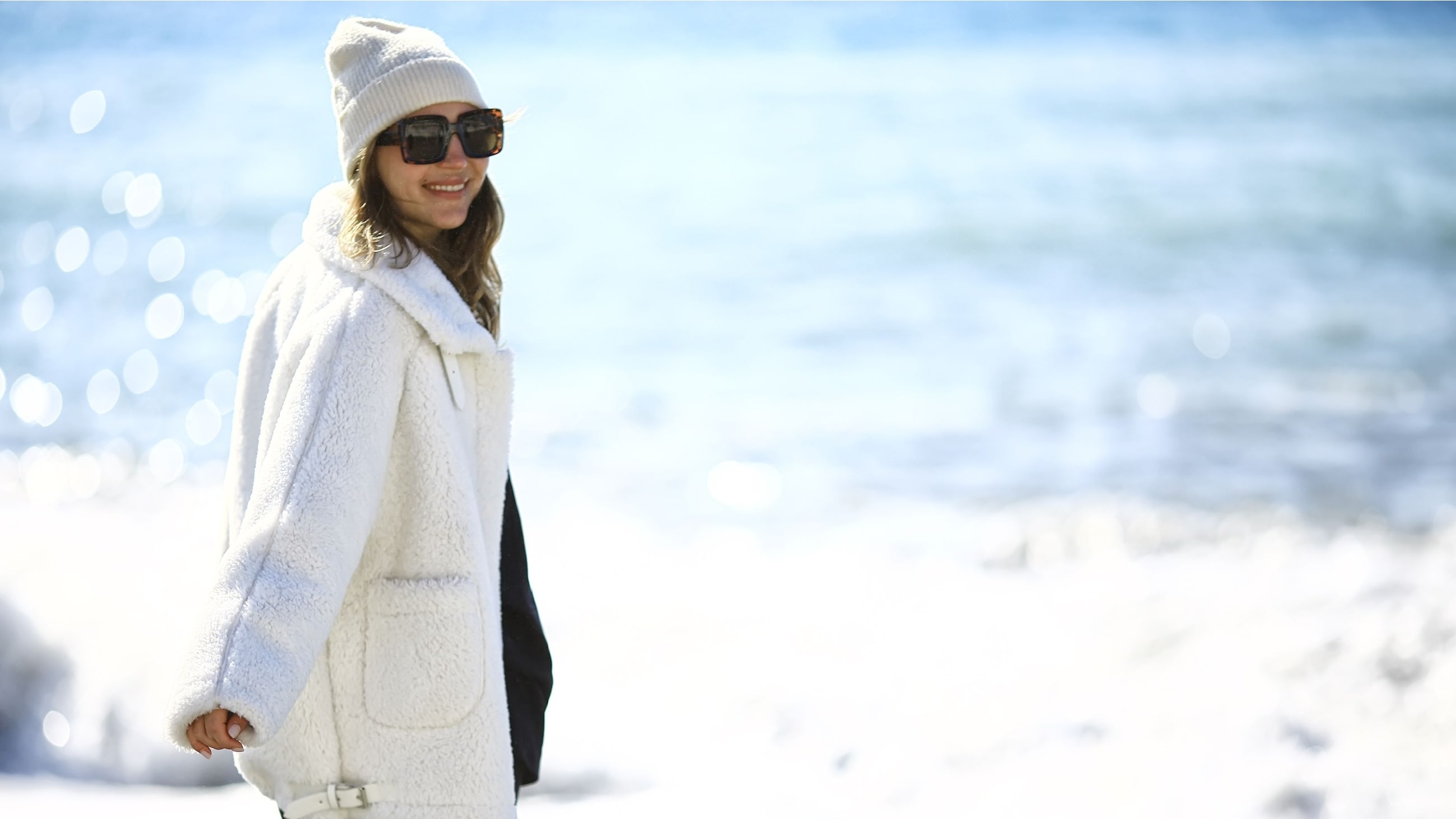 illustration of woman wearing sunglasses in all four seasons