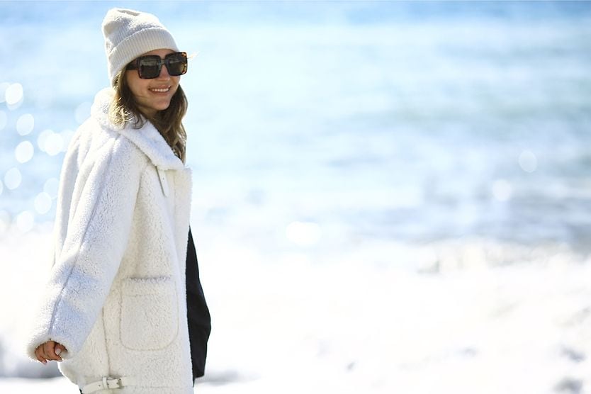 illustration of woman wearing sunglasses in all four seasons