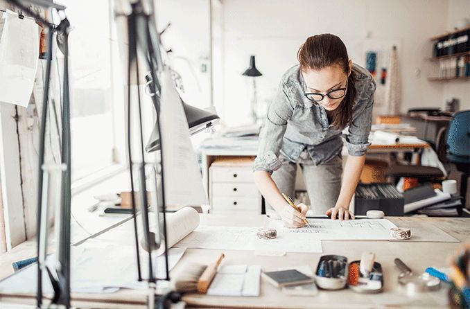 eyeglasses on top of a book