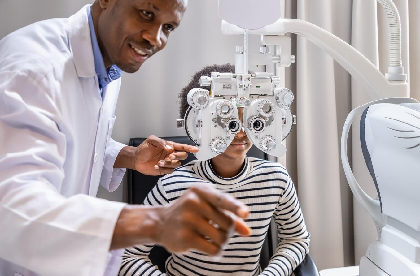 Doctor giving eye exam. Doctor giving eye exam.