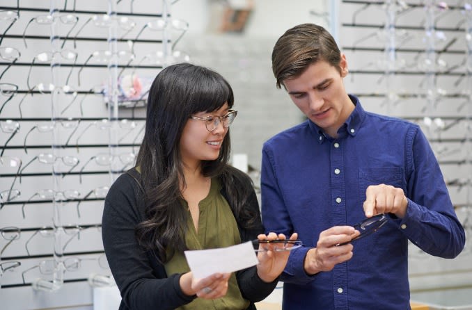 side-by-side of scratched and unscratched eyeglass lenses