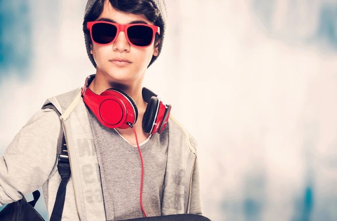 man wearing sunglasses in the tub taking a selfie