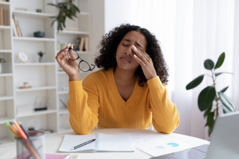 Woman rubbing her eyes. Woman rubbing her eyes.