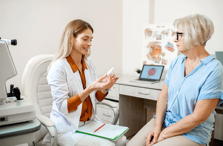 Eye doctor with patient. Eye doctor with patient.