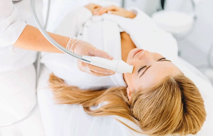 Woman getting IPL treatment