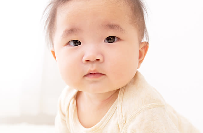 Baby in scarf and hat