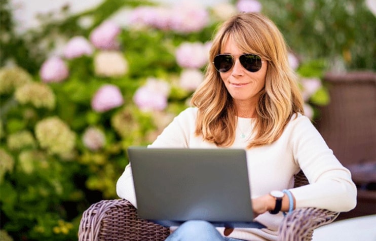 Middle aged woman wearing bifocal sunglasses