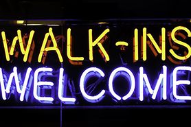 walk-ins welcome neon sign