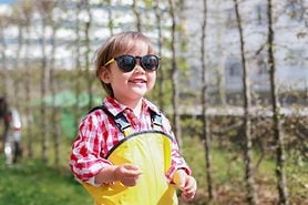 Smiling child wearing sunglasses