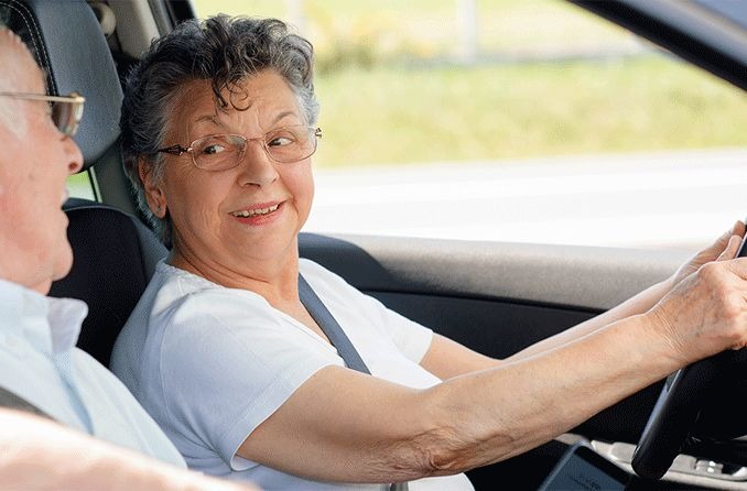 woman over 60 driving car woman over 60 driving car