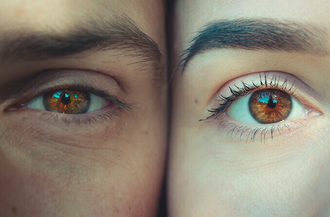 closeup of man and woman eyes