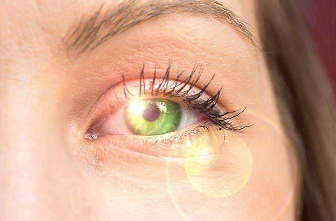 sunlight shining on woman's eye