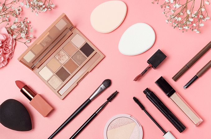 Different types of eye makeup on a pink background Different types of eye makeup on a pink background