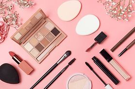 Different types of eye makeup on a pink background