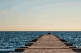 person at the end of the dock staring out into the distance hoping for a nearsighted cure