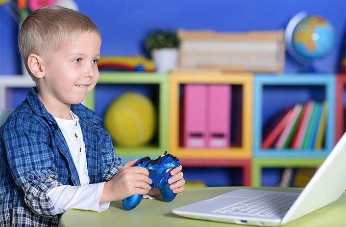 Young boy playing video game